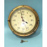 A Smiths Astra brass bulkhead clock, with 20cm dial, (movement working), 27cm overall.