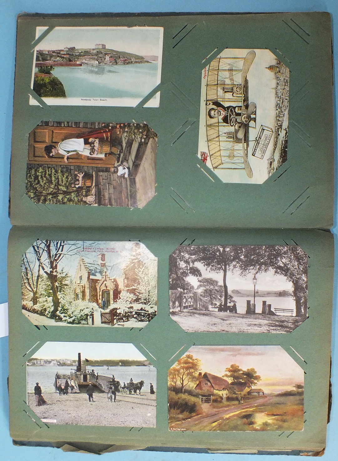 An album of approximately 190 mainly-UK topographical cards, some RPs.