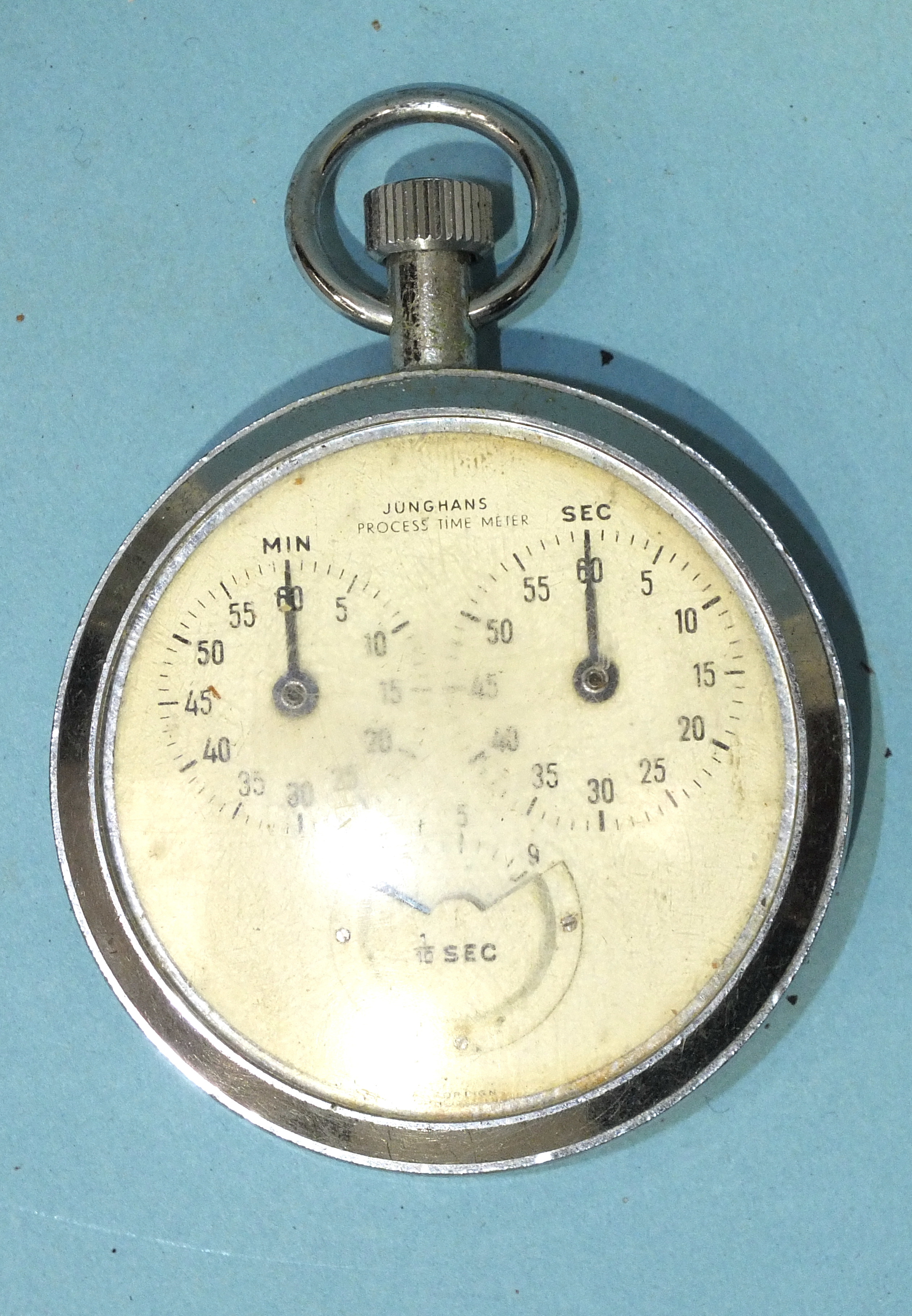 A Junghans Process Time Meter stop watch, chrome, impressed "P. T. Officer HMS Ganges 5", on back.