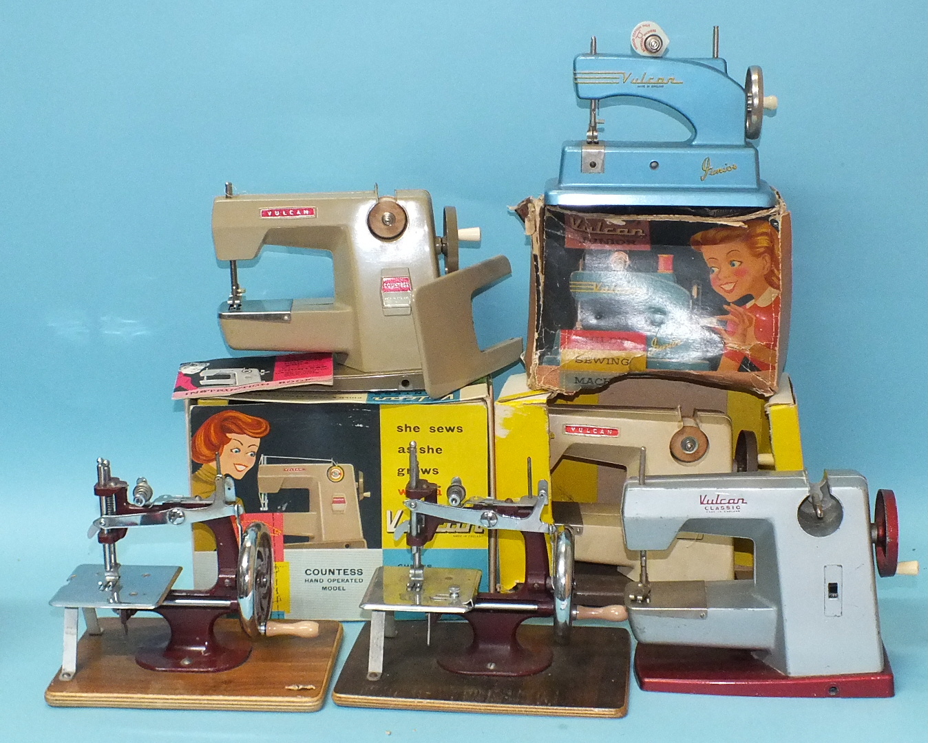 Four Vulcan sewing machines, (3 boxed) and two other child's sewing machines, (6).