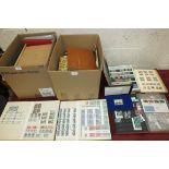 An accumulation of stamps in albums, stock books and loose, in two cartons, mainly Great Britain,