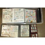 An accumulation of stamps and covers in albums and stock books and loose, including China, also a