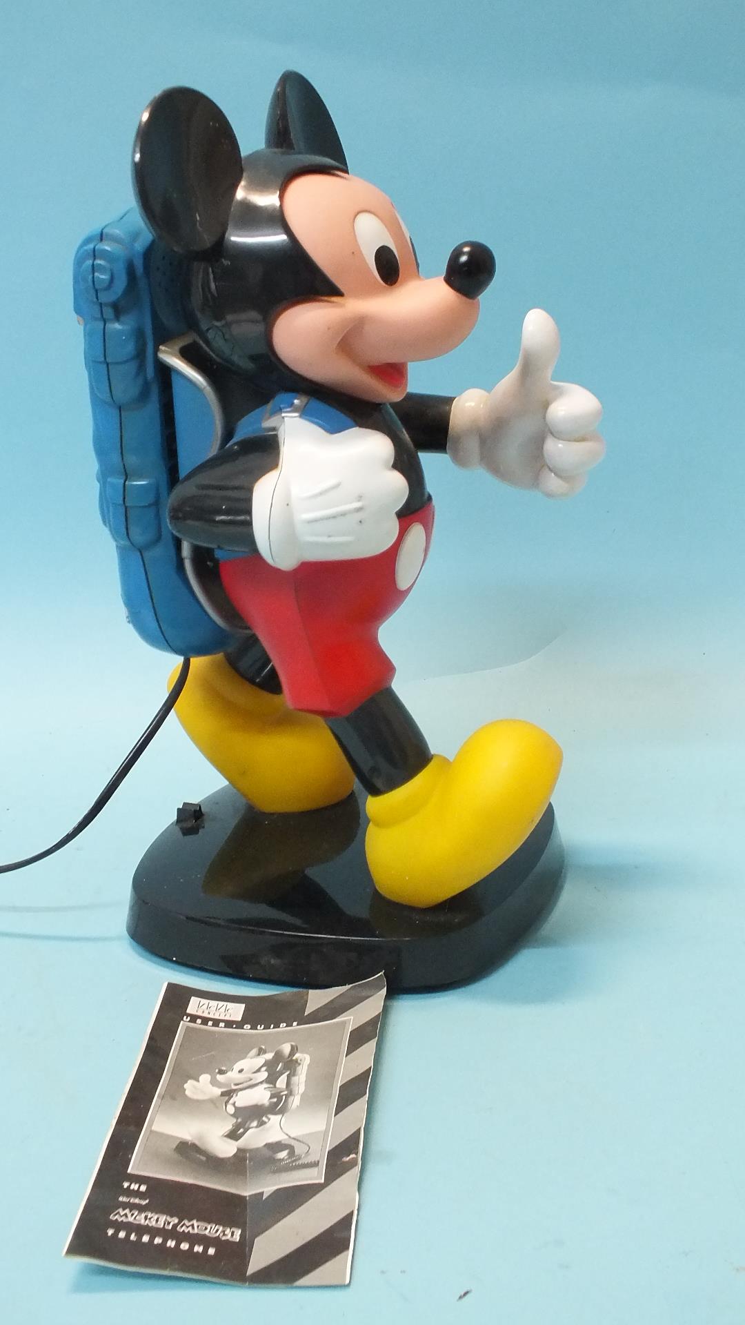 A Mickey Mouse telephone by Tele-Concept, Tyco, 35cm high, with leaflet.