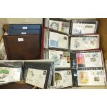 A large collection of Great British first day covers in seven albums and loose, with issues from