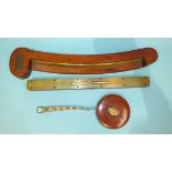 A large Preston & Sons brass-mounted spirit level, 46cm, a hardwood curved spirit level and a
