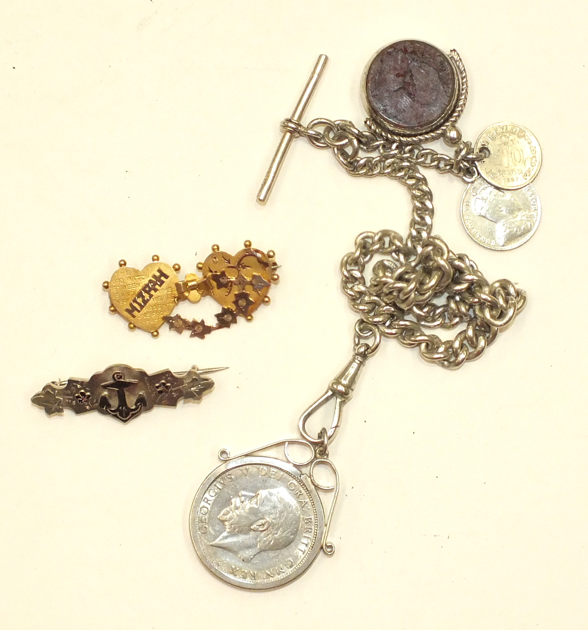 A Mizpah brooch, a silver brooch and a silver watch chain with swivel fob and medallions.