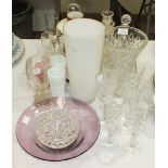 A collection of various glassware, including drinking glasses, decanters, vases, bowls, etc.