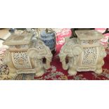 A pair of modern Oriental ceramic elephant garden seats, 40cm high, (2).