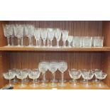 A part-suite of Waterford crystal glasses in the Clare pattern, comprising: whisky tumblers, three