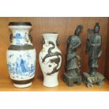 A late-19th century Chinese blue and white crackle glass baluster vase decorated with figures and