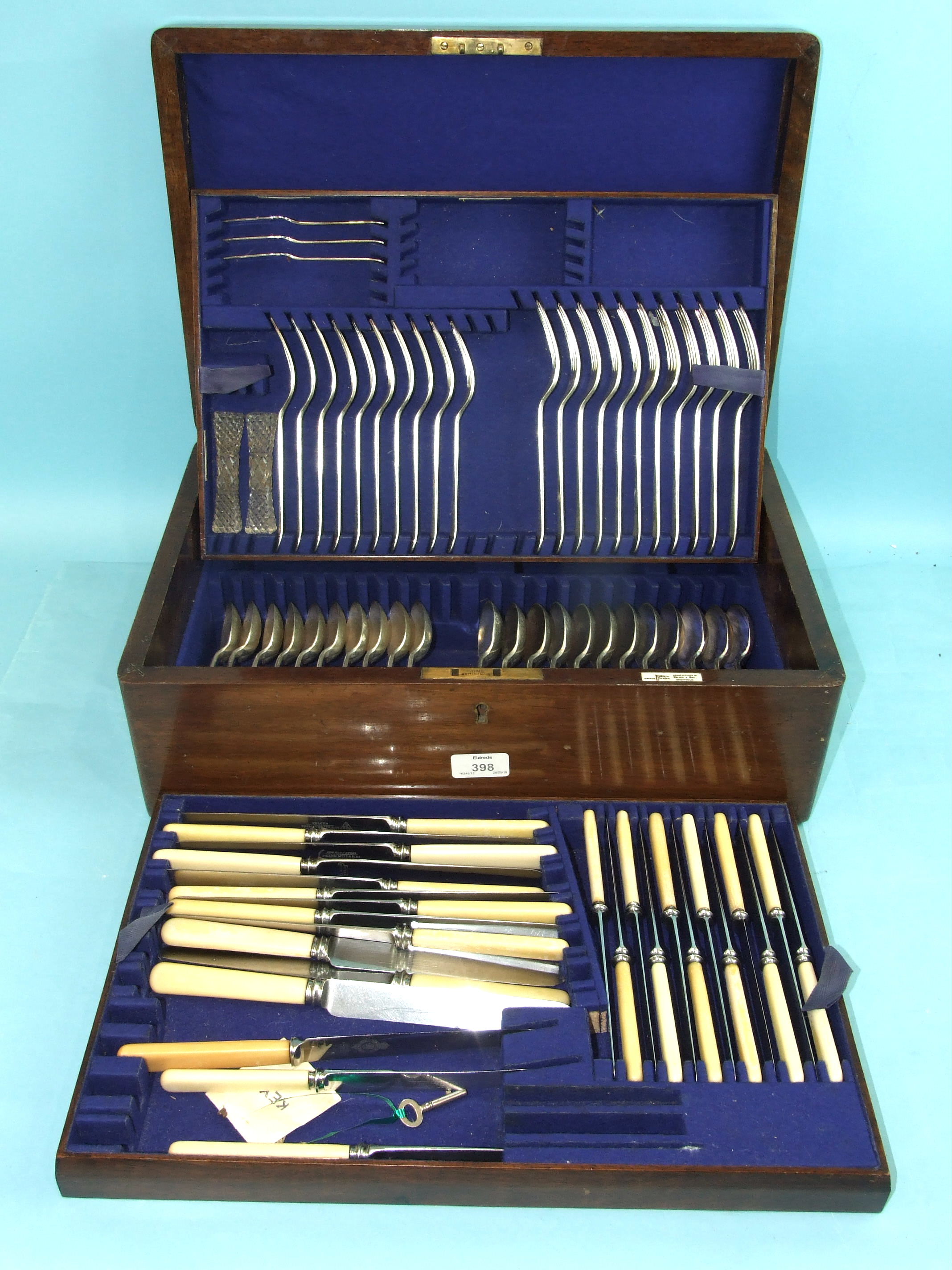 A part-canteen of Walker & Hall Old English pattern plated flatware, in fitted walnut canteen box.