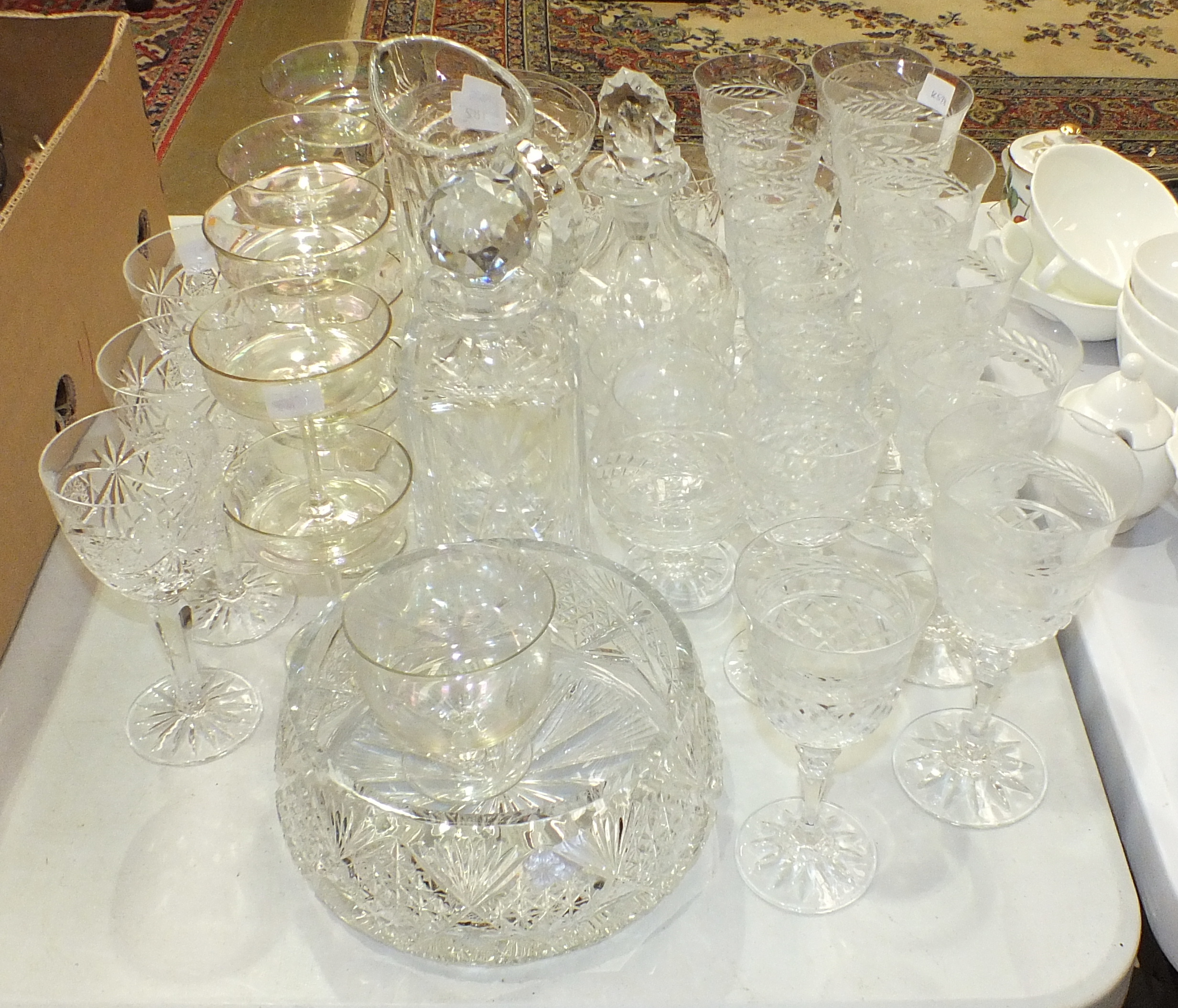 A cut-glass jug, two decanters, a bowl and a collection of various drinking glasses. - Image 3 of 3