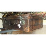 A leather suitcase, 60cm wide.