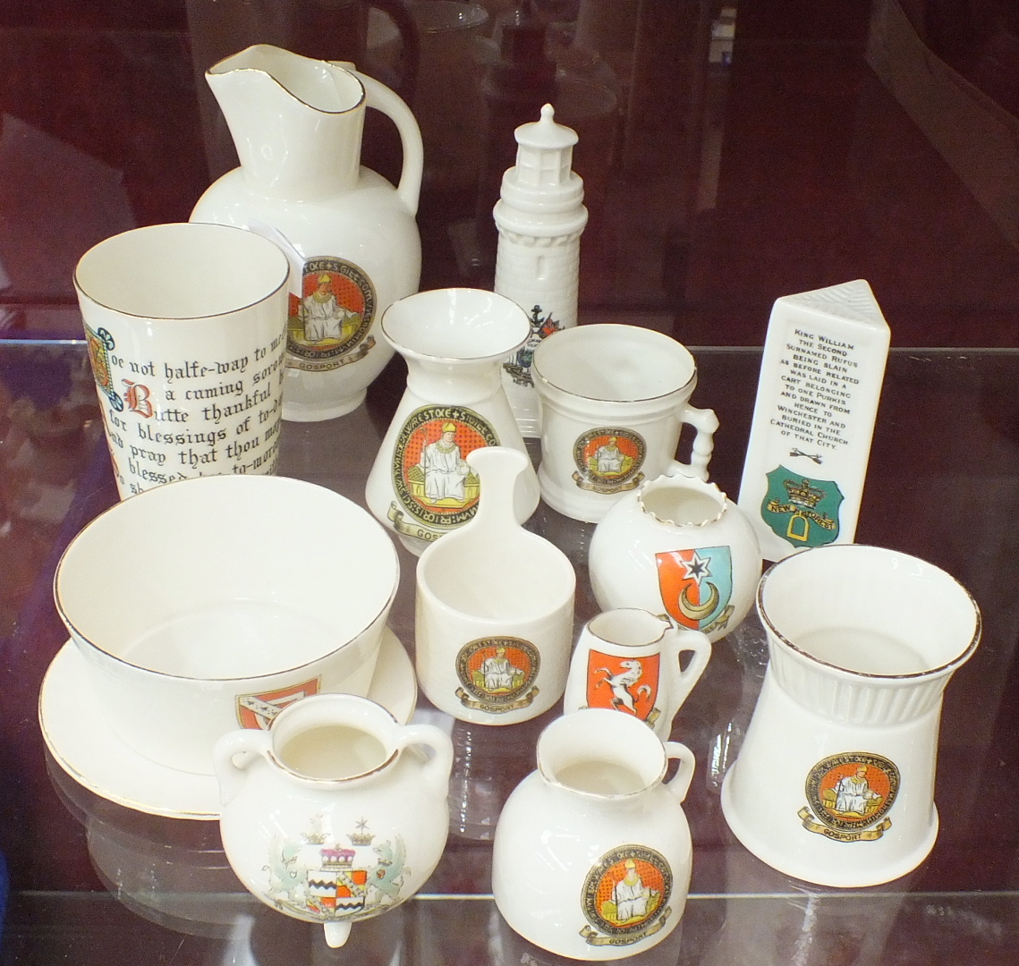 Approximately forty pieces of crested ware, including Arcadian 'Little Bird' with flapper, (