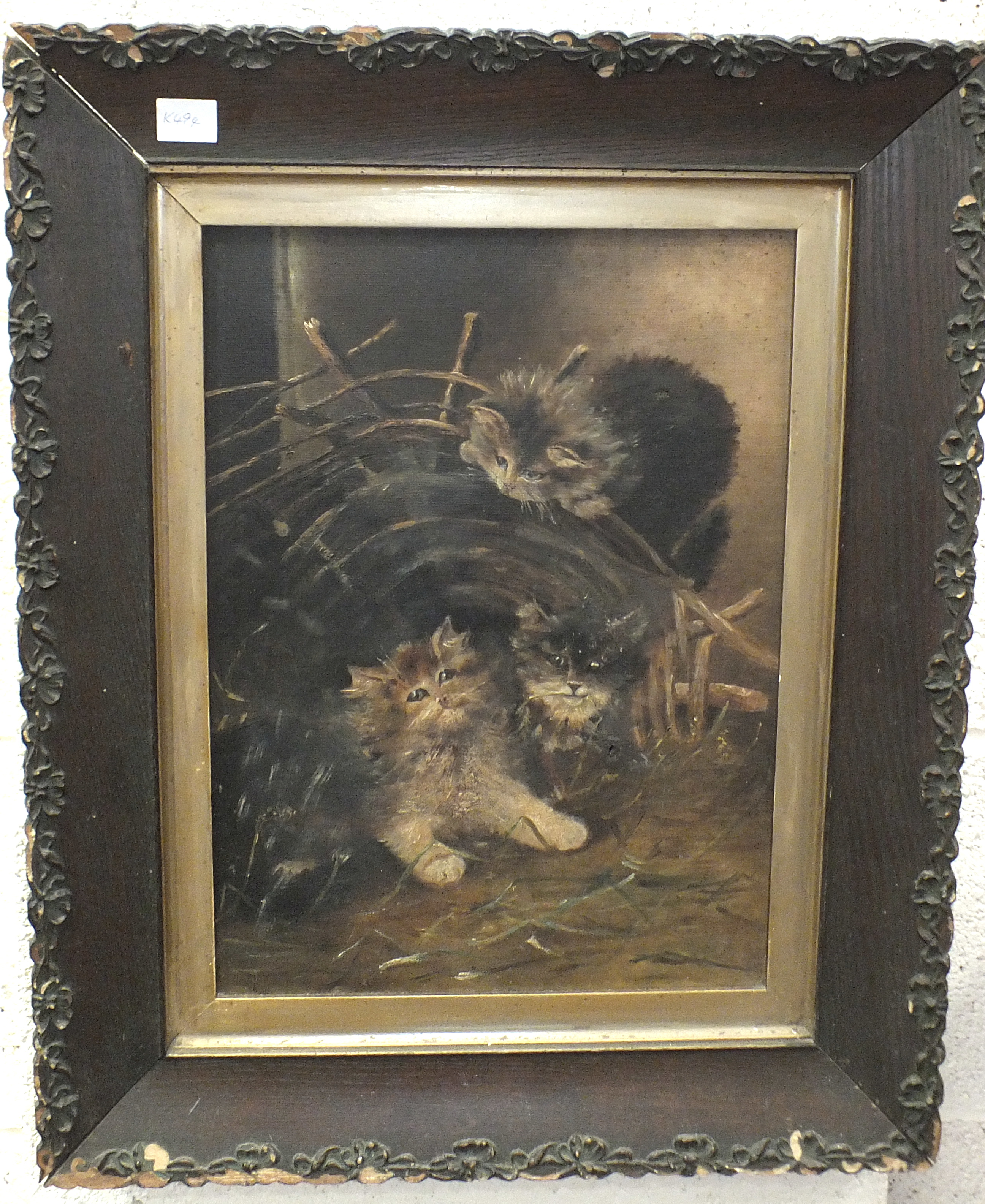 Late-19th/early-20th century, 'Kittens playing in a wicker basket', unsigned oil on canvas, 38 x