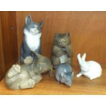 A collection of five Royal Copenhagen figures of a cat 1803, 13.5cm high, a Dachshund puppy 1408,