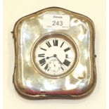 A silver-mounted pocket watch holder, Birmingham 1909, containing a steel-cased keyless pocket