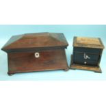 An early-19th century rosewood two-division tea caddy of sarcophagus form, the hinged lid