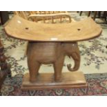 A hardwood elephant stool, 60cm wide, 57cm high and a late-Victorian stained wood and inlaid