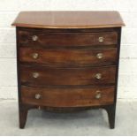 A small mahogany chest of four long graduated drawers, 65cm wide, 70cm high.