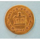 A George III 1798 gold third-guinea.