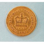 A George III 1803 gold third-guinea.