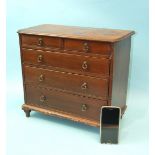 A late-19th century miniature mahogany chest of two short and three long graduated drawers, on