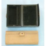 A Mappin & Webb jewellery roll of pale green soft leather, with tan interior, (unused) and a