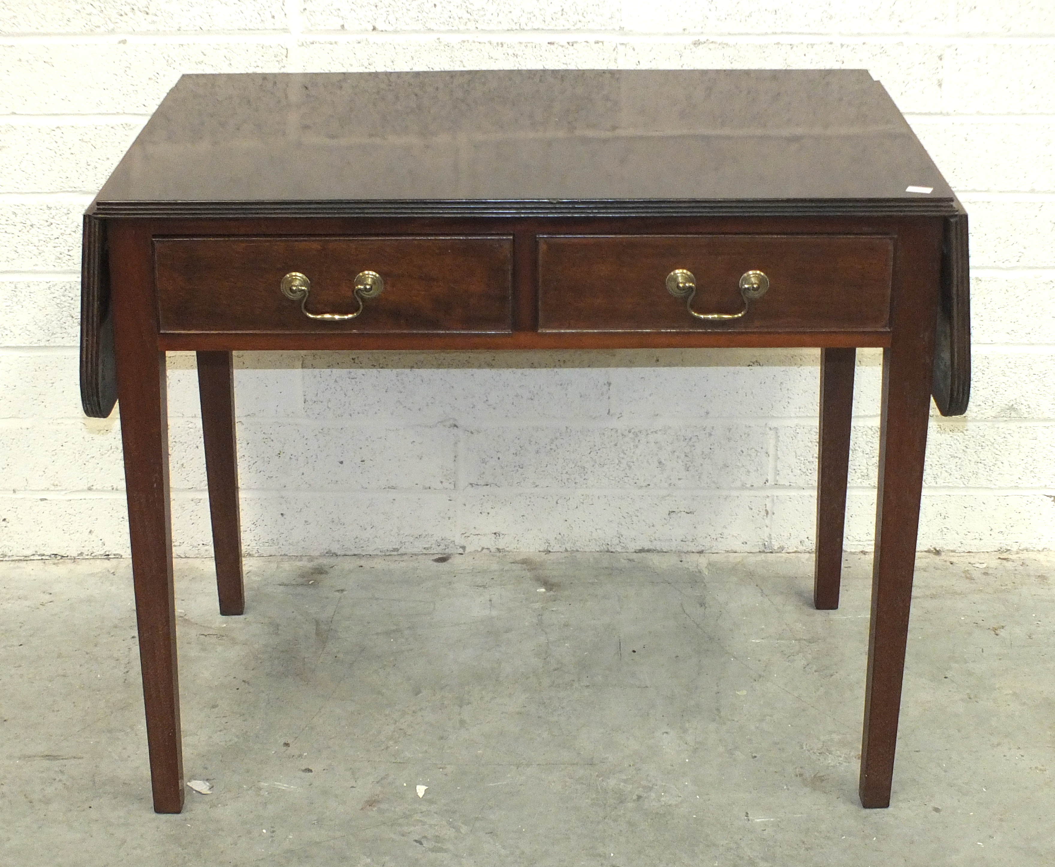 A mahogany two-drawer drop-leaf side table, 139cm open and a small Sutherland drop-leaf table, (2).