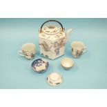 A late-19th century hexagonal porcelain teapot decorated in famille colours with scenes of