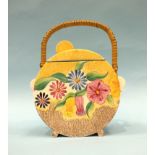 A Clarice Cliff Bizarre biscuit barrel of Bonjour shape, decorated in the 'Petunia' pattern, with