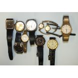A collection of lady's and gentleman's wrist watches.