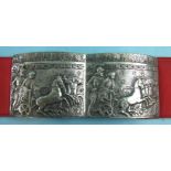 A Continental white metal buckle of two rectangular plaques, each embossed and engraved with a Greek