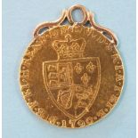 A George III 1790 gold guinea, with pendant attachment.
