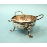 A silver small circular three-handled bowl on three pad feet, 12cm overall, 6cm high, Birmingham