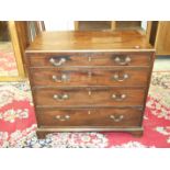 A George III mahogany rectangular chest of four long graduated drawers, on bracket feet, 91cm