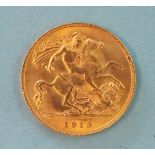 A George V 1913 gold half-sovereign.