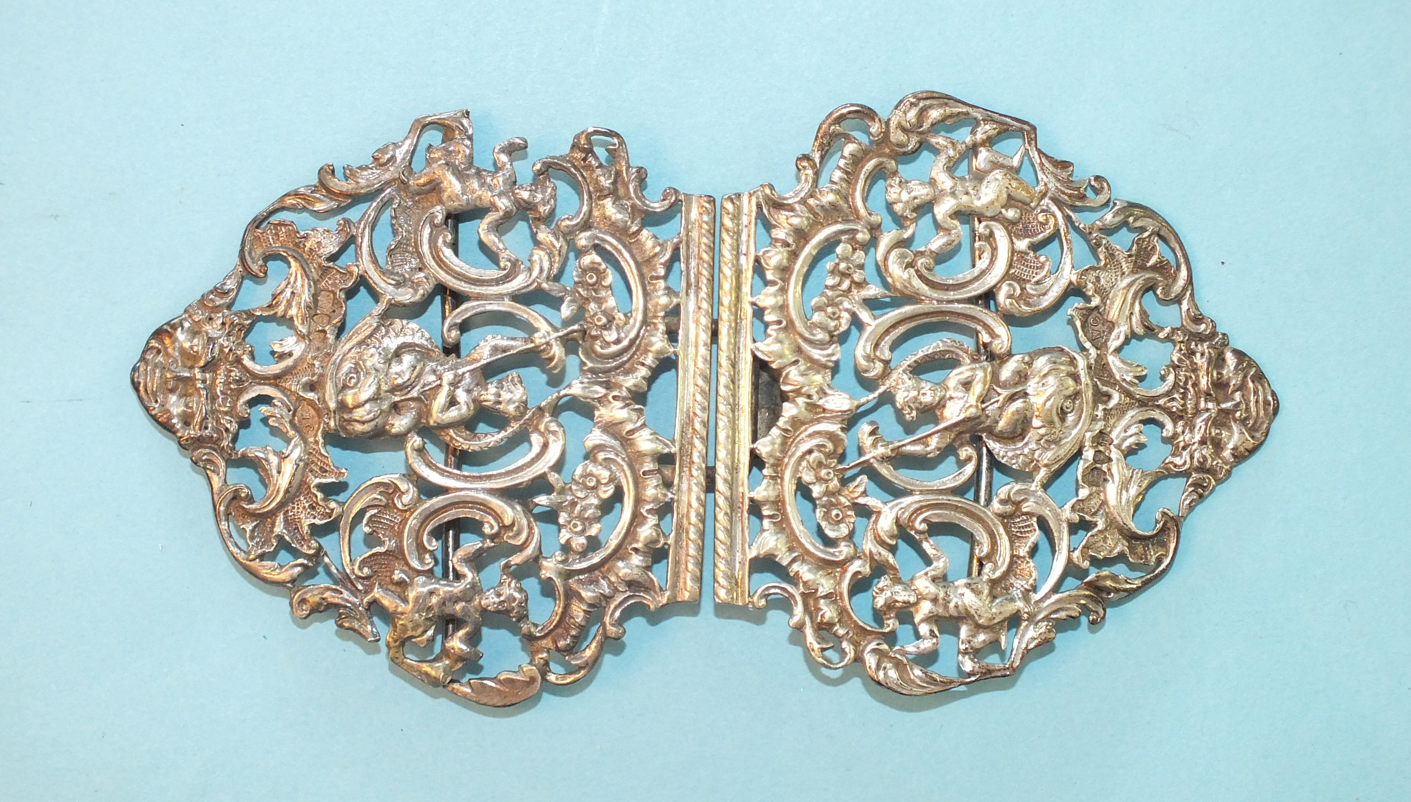 A Victorian silver two-piece buckle of pierced Rococo design, maker WC, London 1892, 57.8g.