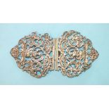 A Victorian silver two-piece buckle of pierced Rococo design, maker WC, London 1892, 57.8g.