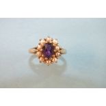 An amethyst and pearl cluster ring with 9ct yellow gold mount, size K, 3.3g.