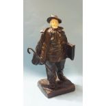 V Rousseau (Belgian 1865 - 1954), a bronze and ivory figure of an artist wearing a cape and