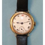 A gentleman's 9ct-gold-cased wrist watch, the white enamel dial with Roman numerals and seconds