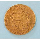 A George III 1775 gold guinea.