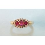 A 9ct gold ruby and diamond cluster ring, size M½, 309g.