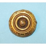 A Victorian circular locket-back brooch with cannetille decoration, 27mm diameter, gross weight 6.