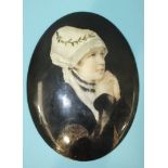 An oval KPM Berlin porcelain plaque painted with the head and shoulders of a young woman at