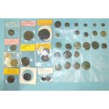A collection of Roman and other early bronze and metal coins.