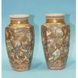 A pair of Satsuma octagonal-shaped vases, profusely-decorated with figures, 18.5cm high, (2).