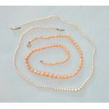 A necklace of 73 graduated pale coral beads, 2.5-6mm, strung with a seed pearl between each, to gold