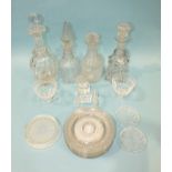 A collection of four cut-glass decanters and stoppers, tallest 32.5cm high and other glassware.